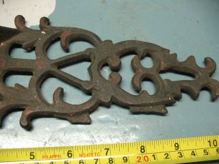 ANTIQUE SCROLLED CAST IRON BOOT JACK 2