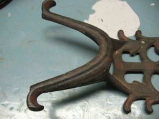 ANTIQUE SCROLLED CAST IRON BOOT JACK 3