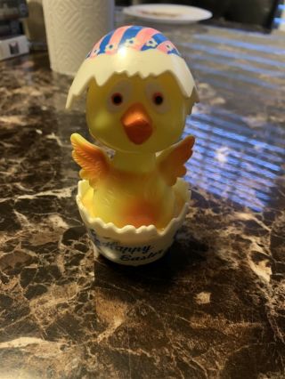 Vintage Easter Hard Plastic Chick In Egg Friction Rolling Wheels Toy