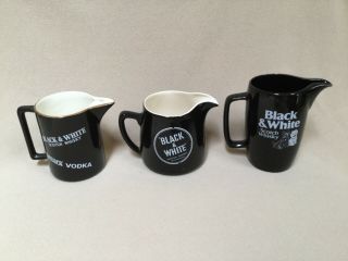 Set Of Three Vintage Black & White Whisky Water Pitchers/ Pub Jugs
