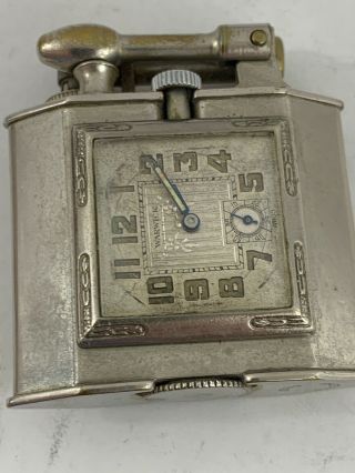 Vintage Triangle Lift Arm Pocket Lighter With A Watch