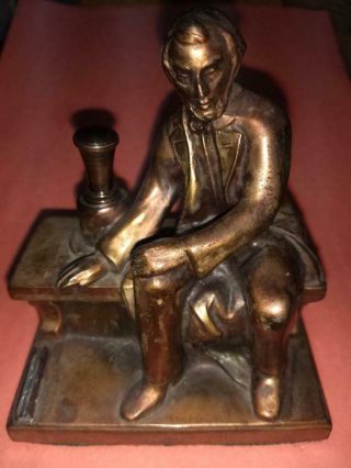 Rare Royal Bronze Colored Abe Lincoln Striker Table Lighter By Ronson - Amw - 1935