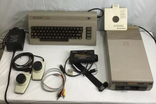 Commodore 64 Computer W/ 1541 Floppy Drive,  2 Commodore Controllers Plus More