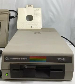Commodore 64 Computer W/ 1541 Floppy Drive,  2 Commodore Controllers Plus More 2