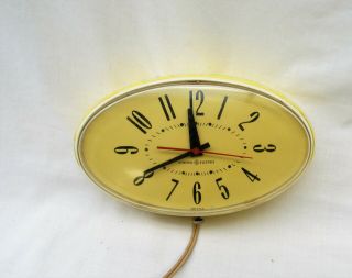 Vintage Ge Electric Wall Clock Yellow Mid Century Oval For Repair Or Parts Rare