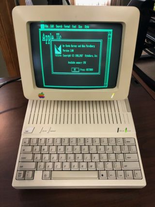 Apple Iic W/monitor,  Serial Cable,  And Documentation