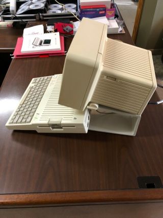 Apple IIc w/Monitor,  serial cable,  and documentation 3