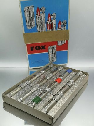 Highly Rare box of 12 FOX old stock Austrian made.  petrol imco type lighter 3