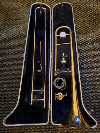 Vintage Conn Director Brass Trombone.  Comes With Case,  Top Latch Is Missing On