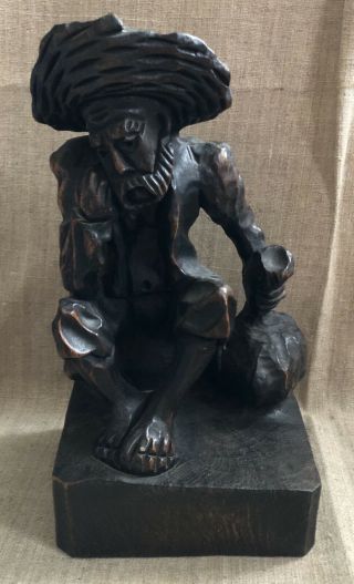 Hand Carved Wooden Figure Of Sitting Man In Hat With Sack Vintage