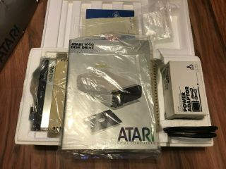 2 Atari 1050 5.  25” Disk Drives W/manuals - Cables - Misc Floppies