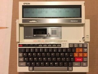 EPSON PX - 8 COMPUTER WITH MULTI UNIT 64,  PF - 10AA DISK DRIVE,  P - 80 PRINTER & CX - 20 2