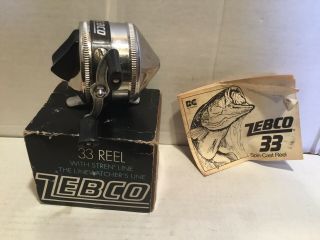 Vintage Zebco 33 Fishing Reel And Paper.  Made In Usa.