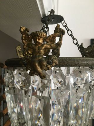 Antique French Lead Crystal Bag Chandelier With Brass Putti And Elegant Crystal