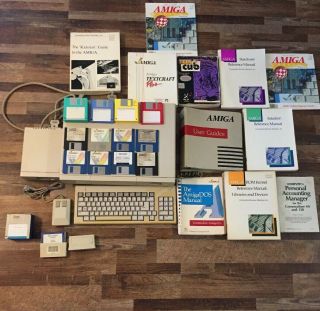 Amiga 1000; Includes Keyboard,  Mouse,  Powercord,  Disk Drive,  Manuals & (52) Disks