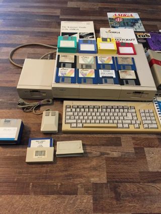 Amiga 1000; includes Keyboard,  Mouse,  Powercord,  Disk Drive,  Manuals & (52) Disks 2