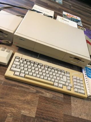 Amiga 1000; includes Keyboard,  Mouse,  Powercord,  Disk Drive,  Manuals & (52) Disks 3