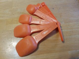 Vintage TUPPERWARE Set of 7 Orange Nested Measuring Spoons 3