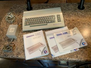 Commodore 64c Computer With Manuals And Power Cord