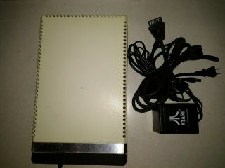 ATARI 1050 DISK DRIVE WITH POWER CORD POWERS ON AND SPINS 2