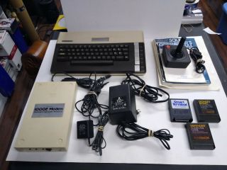 Atari 800xl Computer W/ Power Supply Brick And Av Cable,  1000e Modem,  Games