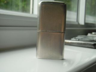 Howitt Lighter,  Solid Silver.  Assayed In 1942