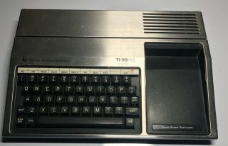 Ti - 99/4a Computer W/ Joysticks,  Game Cartridges,  & Speech Synthesizer