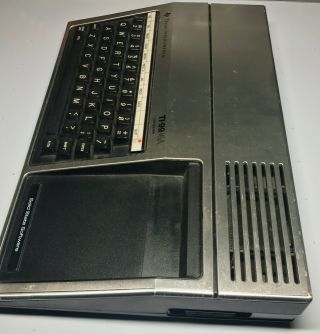 TI - 99/4A Computer w/ Joysticks,  Game Cartridges,  & Speech Synthesizer 2