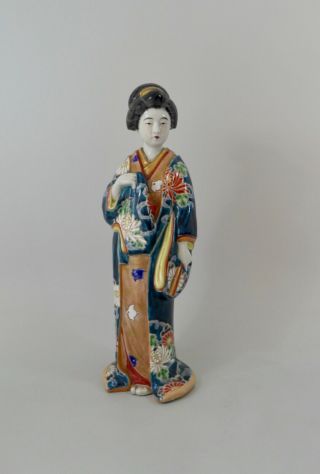 Kutani Porcelain Figure Of A Bijin,  C.  1890.  Meiji Period.