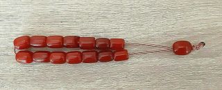 Antique Faturan Cherry Amber Beads Marbled 52.  8 Grams.