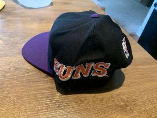 Vintage Phoenix Suns 90s Sports Specialties Script Snapback Hat.