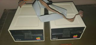 Two APPLE COMPUTER DISK II 5.  25 FLOPPY DRIVES 2
