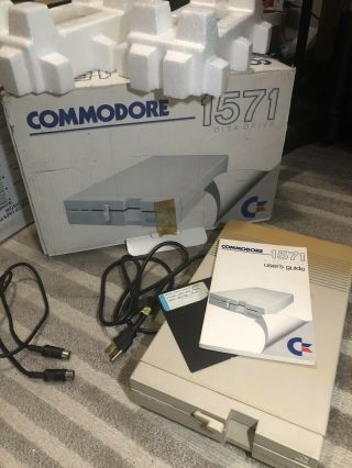 Commodore 1571 Disk Drive | | Comes With User Guide