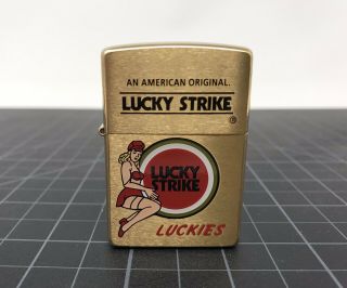 1999 Brushed Brass " Luckies " Lucky Strike Cigarette Zippo Lighter " Pin Up Girl "