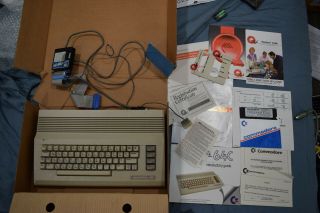 Commodore 64c Computer With Manuals,  Psu,  And Accessories