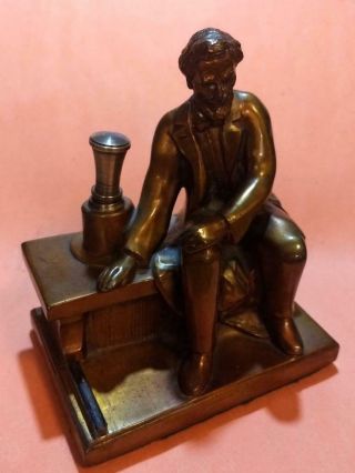 Gold Highlighted Copper Abe Lincoln Striker Table Lighter By Ronson - Amw - 1935