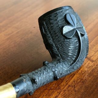 An Antique Irish Bog Oak Pipe,  Traditionally Decorated With Harp And Shamrock.