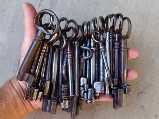 22 Mostly 19th Century French Wrought Iron Keys