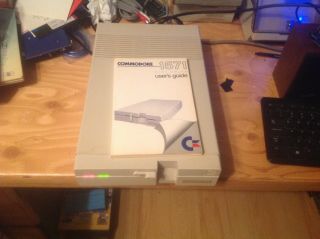 Commodore 1571 5.  25 " Disk Drive - -.  For Commodore 64 128