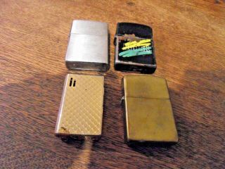 Three Zippo Lighters Plus One Other Cosmic.  Vintage Solid Brass Etc