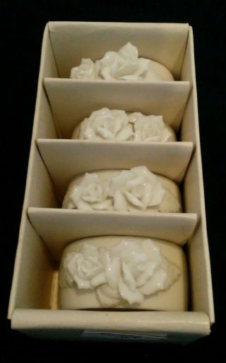 Set Of 4 Vintage White Bone China Napkin Rings With Embossed Roses.  In Partial B