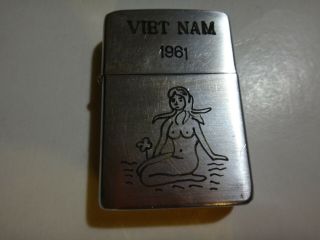 Vietnam War Year 1961 Zippo Lighter Vietnam 1961 And Nude Lady Holds A Flower