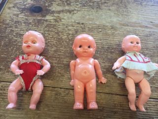 Three Vintage Celluloid And Hard Plastic Irwin Kewpie,  Hong Kong/jointed Doll