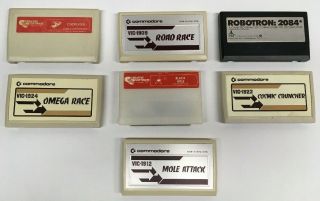 7 Commodore Vic - 20 Cartridges: Black Hole,  Robotron,  Choplifter,  Road Race,  Etc
