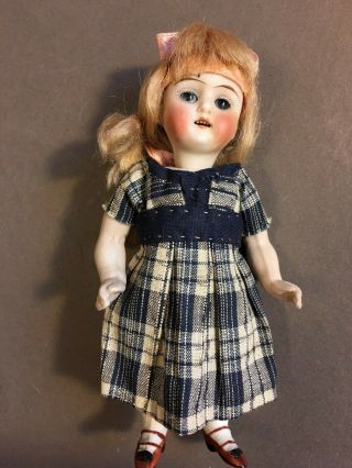 Antique All Bisque Doll Glass Eyes 620.  4 5 1/2 Inches Tall