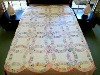 Small,  Vintage Feed Sack Hand Sewn Wedding Ring Quilt; 77 " By 65 "