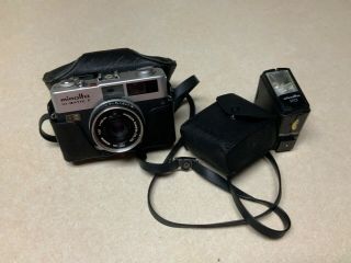 Vtg Minolta Hi Matic F Camera With Rokkor 1:27 Lens And Flash In Case
