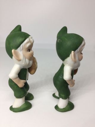 2 Vintage Elves carrying Football figurines Ceramic Christmas Vtg Green Elf 3” 2