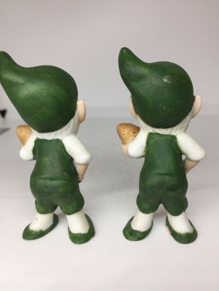 2 Vintage Elves carrying Football figurines Ceramic Christmas Vtg Green Elf 3” 3