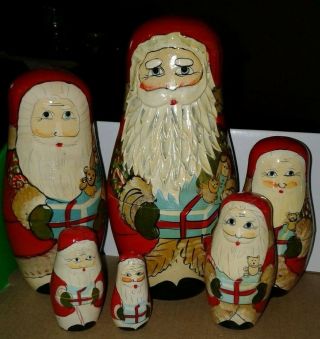 Vintage 6 Piece Handmade Hand Painted Wood Santas Nesting Dolls